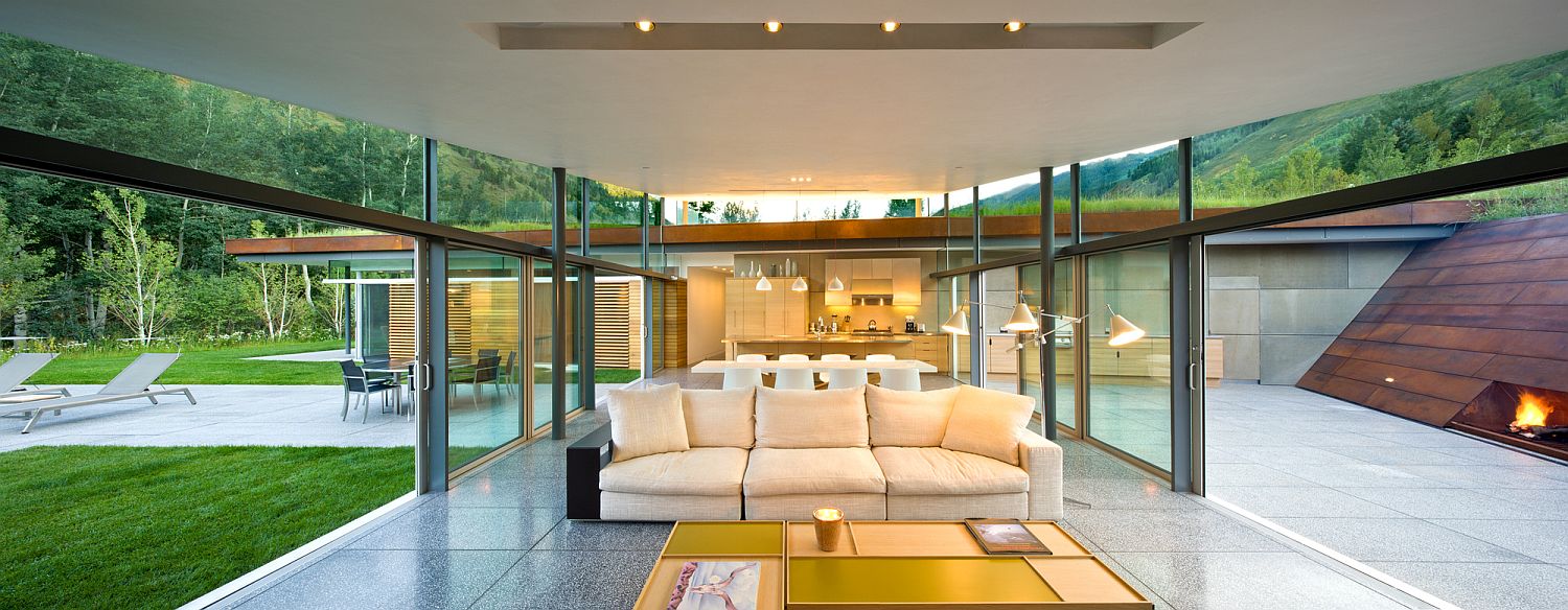 Pavilion style sitting area surrounded by glass walls and sliding glass doors