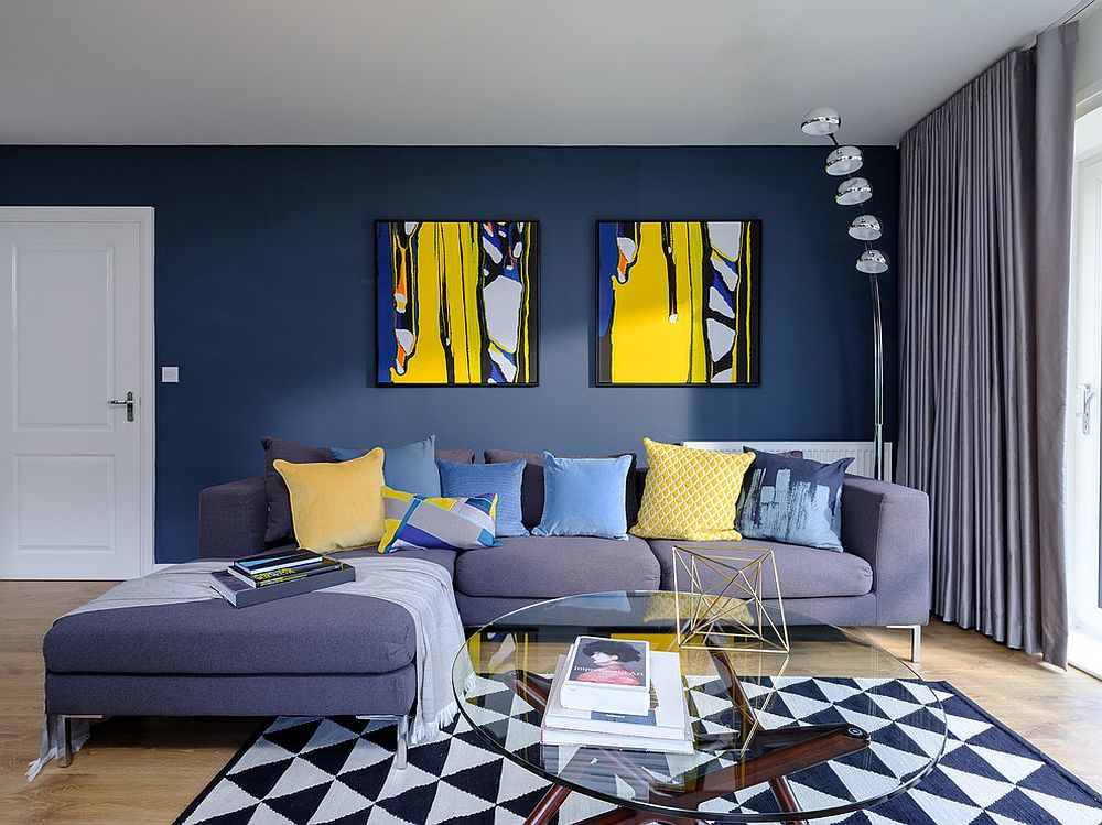 Beautiful contemporary living room in blue with a geo rug