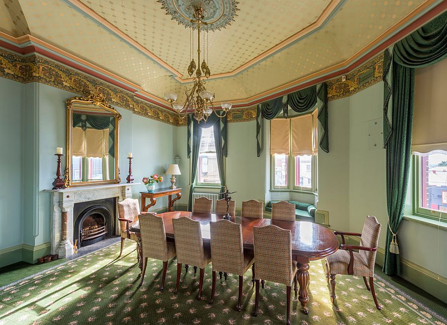 Victorian style dining room with ornate ceiling