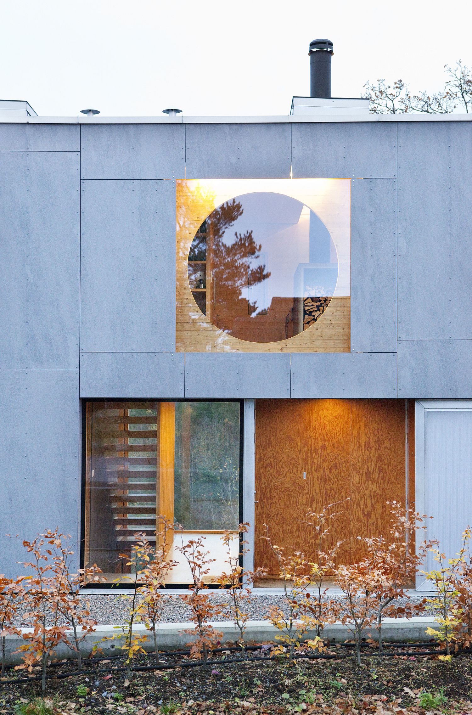 Wood draped in fiber cement provides the perfect all-weather exterior for the home
