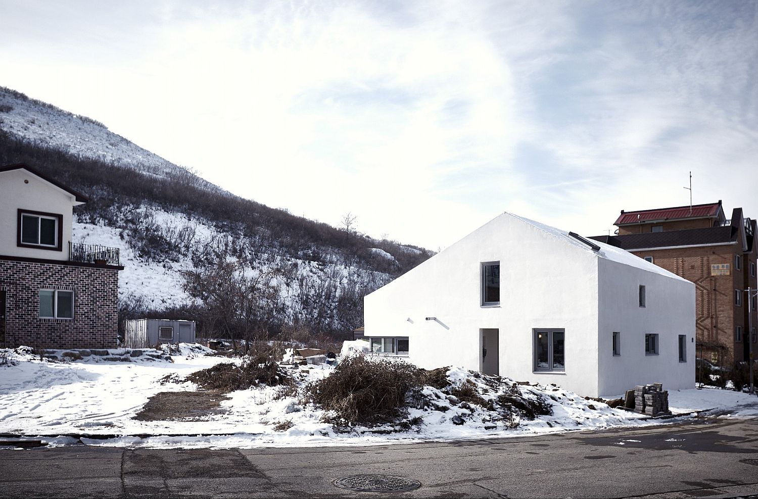 Snow-clad landscape around the contemporary home