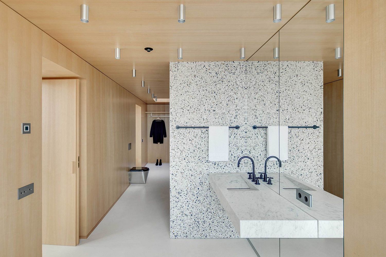 Wooden walls create a sense of coziness inside the apartment