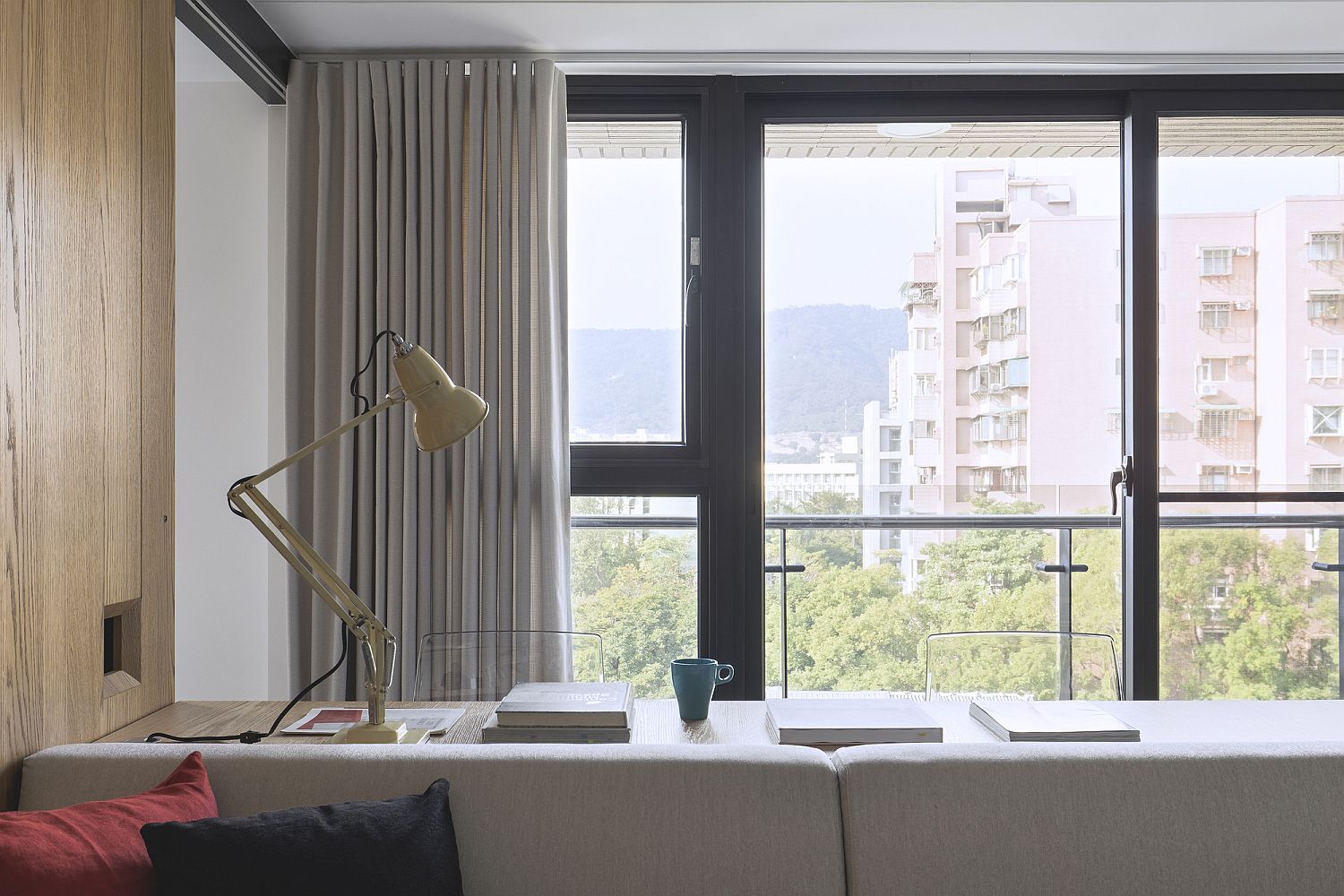 Windows and drapes usher in filtered natural light