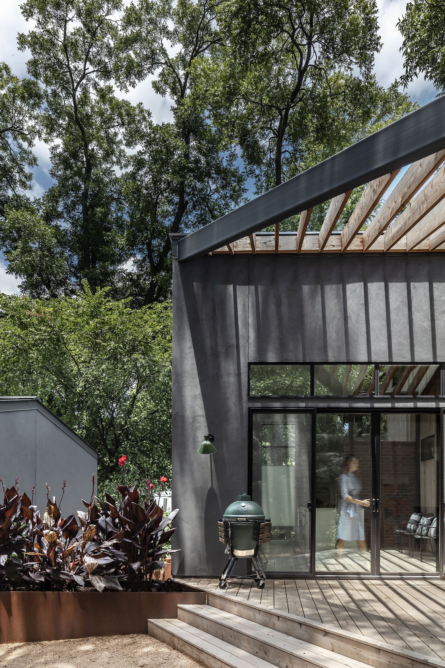 Pergola offers natural shade to the deck outside