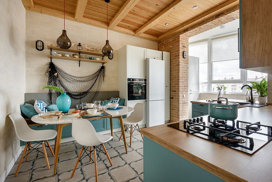 White and blue beach style kitchen with smart design and a casual, relaxing backdrop