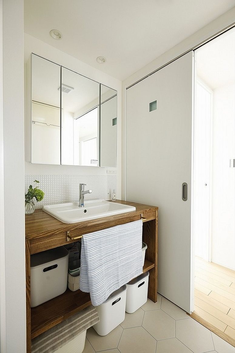 Baskets and bins along with storgae units add to the spatial appeal of the element