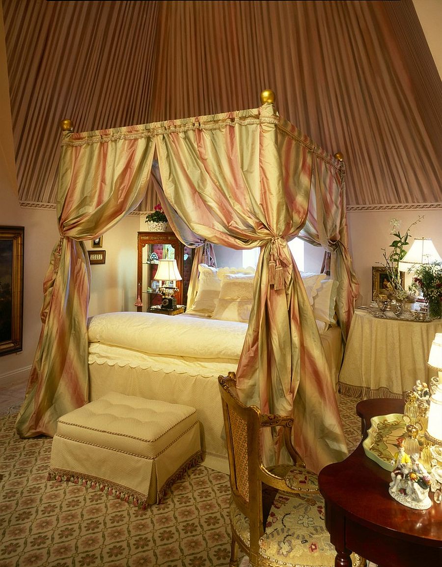 Bedroom of the New York home with a canopy bed and a dash of color