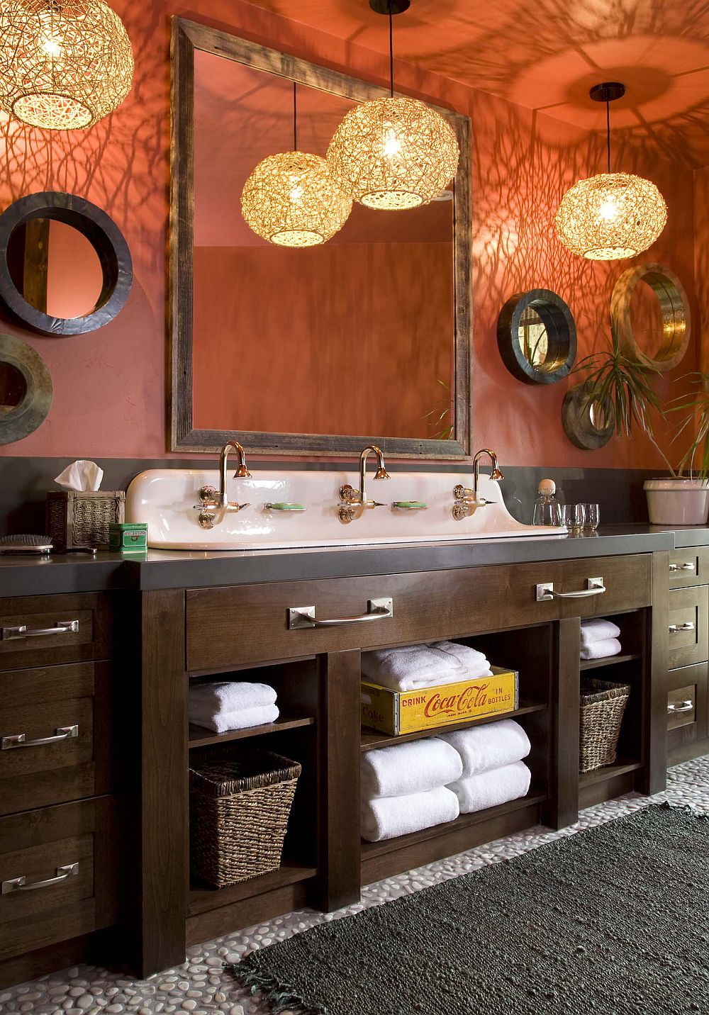 Lighting adds a brilliant appeal to the bathroom in orange