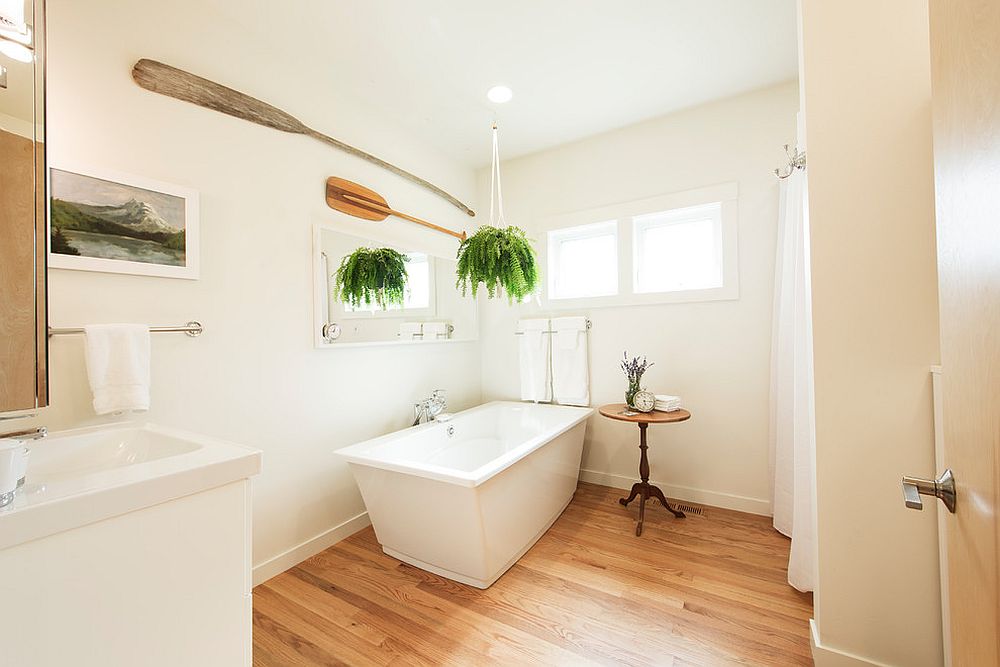 Making most of space in the small contemporary bathroom with wooden floor