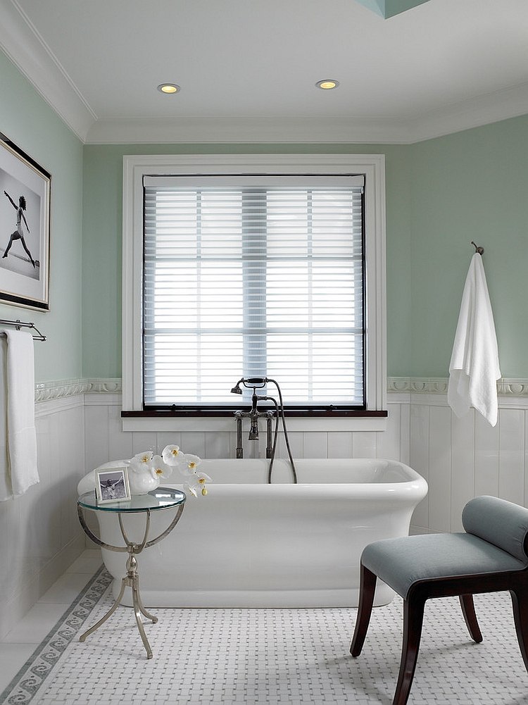 Pastel green and white make a cool combination in the exquisite bathroom
