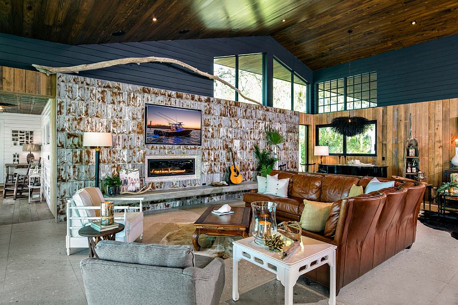 Rusted metallic wall and navy blue for the spacious living room
