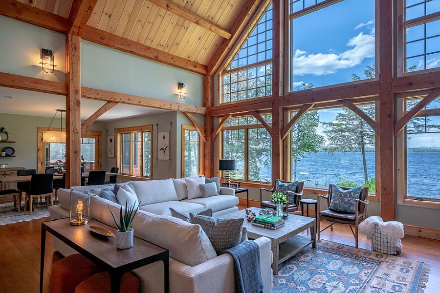 Spacious living room of the lake house with a gorgeous view and modern rustic style