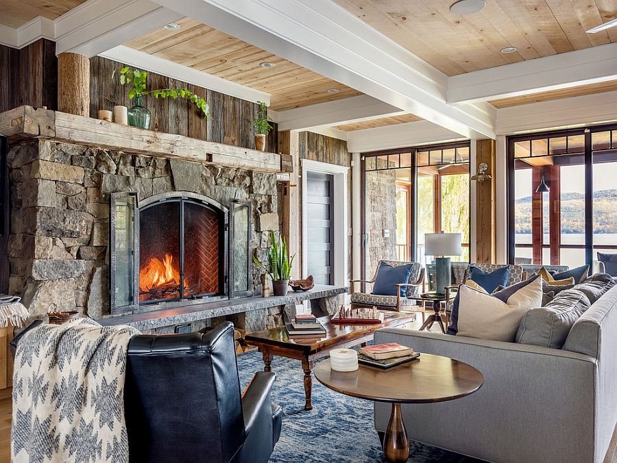 Stone fireplace coupled with accent wooden feature in the small rustic living room