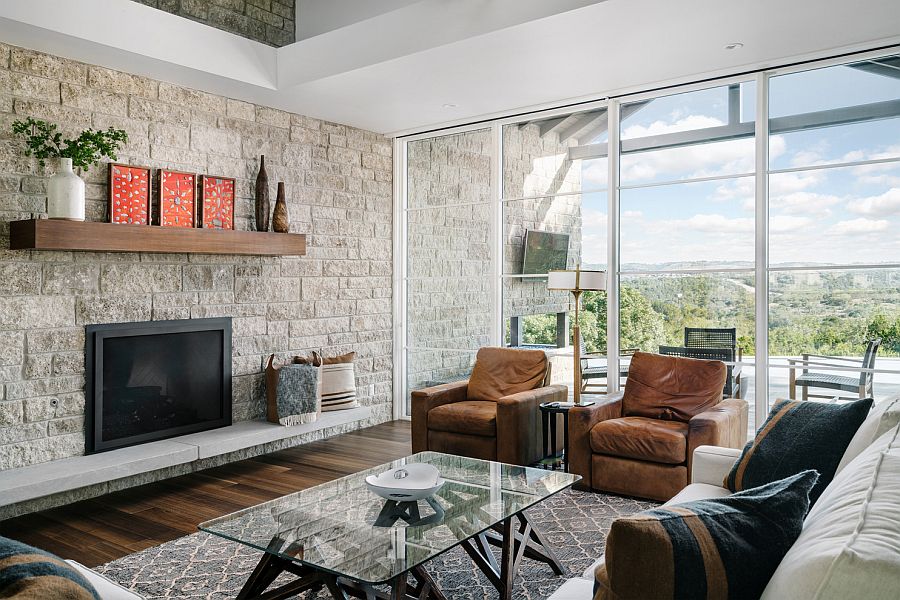 Stone wall for the modern rustic living room in white with glass walls