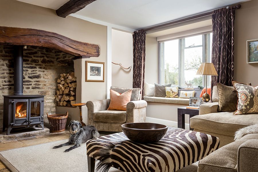 Traditional fireplace is the heart of this beautiful rustic living room
