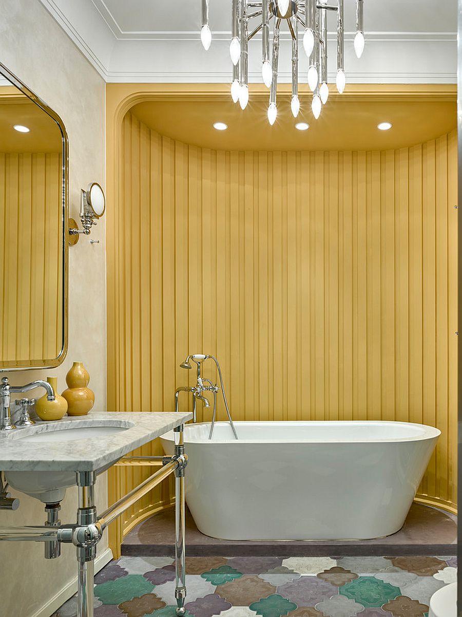 Unique yellow accent wall for the modern bathroom using colorful floor tiles