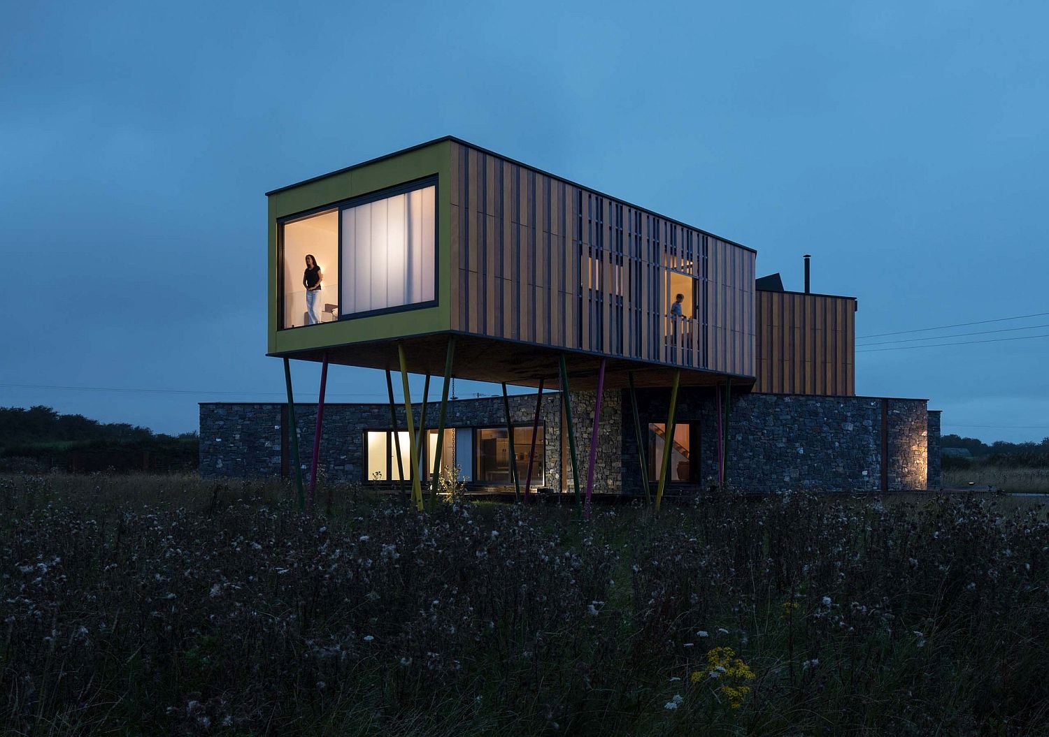 Cantilevered upper level of the house overlooking the meadows in the distance